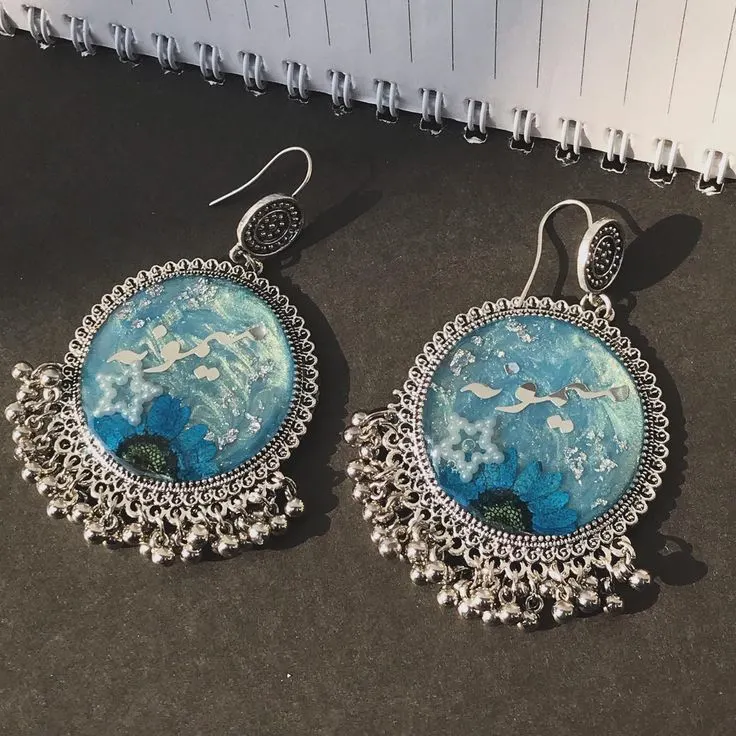 Bling On® Blue Real Flower Resin Jhumka Earrings – Personalized Elegance in Every Curve! 💙 (1)