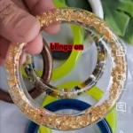 Clear Resin Bangle with Gold Flakes ✨ Luxury Handmade Jewellery for Gen Z Millennials Gift Buyers Trending in India Bling On® 1 1 • Bling On- Clear Resin Bangle with Gold Flakes ✨ Luxury Handmade Jewellery for Gen Z, Millennials & Gift Buyers Trending in India – Bling On®