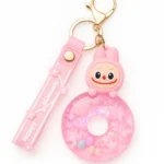 Cute pink character donut keychain  adorable accessory for bags keys   Bling On