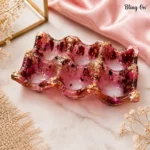 Pink Resin Tray with Gold Foil Flakes and Purple Confetti Featuring Wavy Edges and Placed on Marble Surface  Bling On